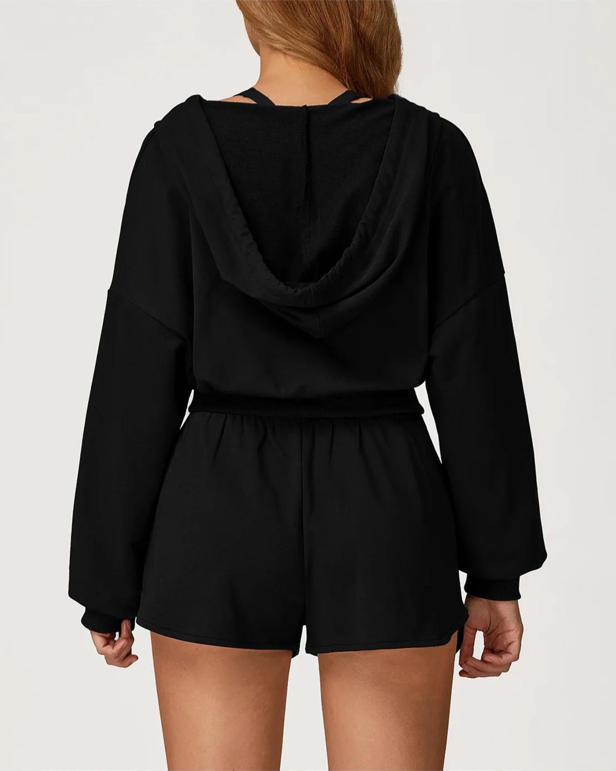 Premium Zip Hoodie für Damen in Schwarz, Rückansicht.