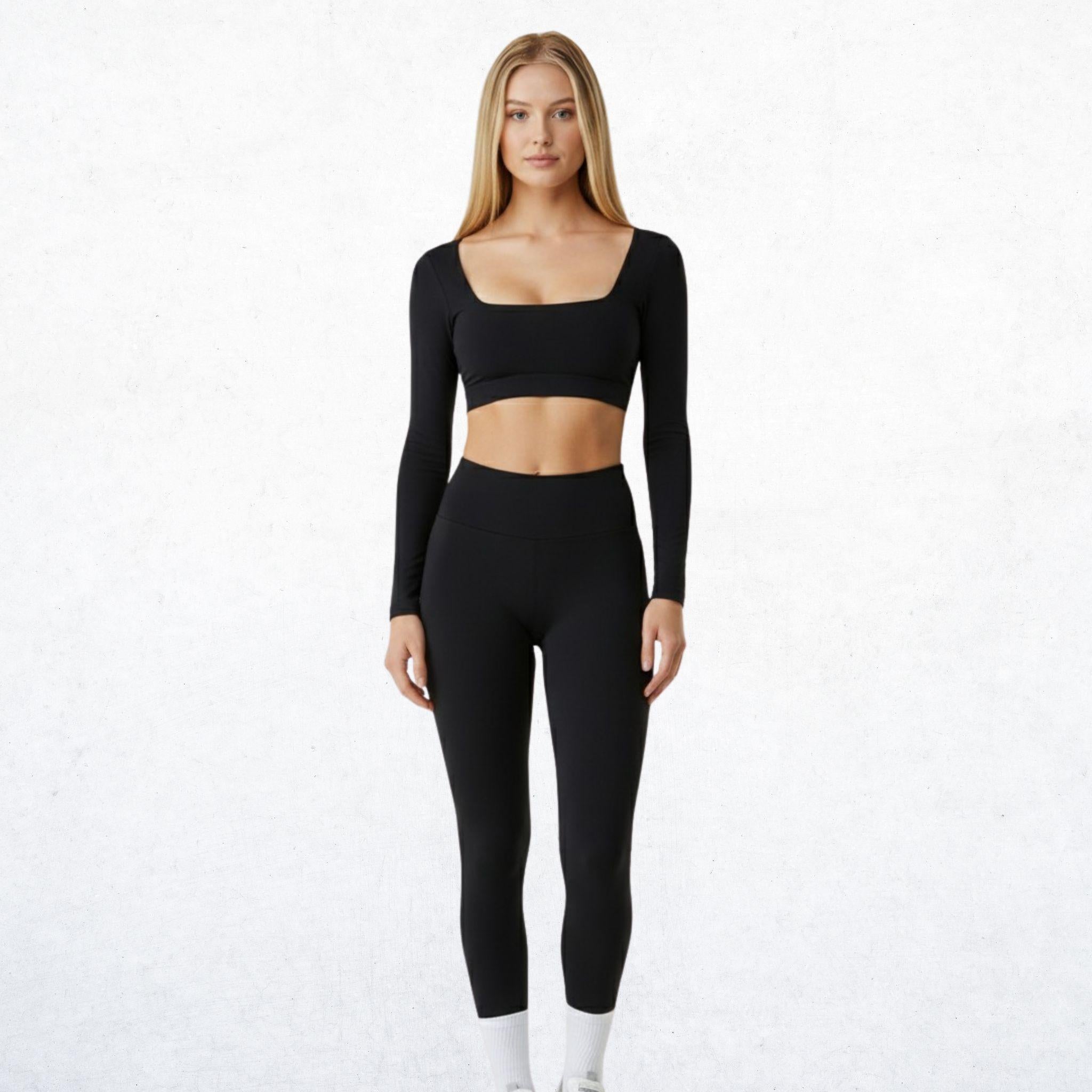 Elegantes, zweiteiliges Sport-Set für Damen in klassischem Schwarz. Vielseitiges Outfit mit stilvollem Design für Workout, Yoga oder den Alltag. Atmungsaktiv, bequem und funktional.