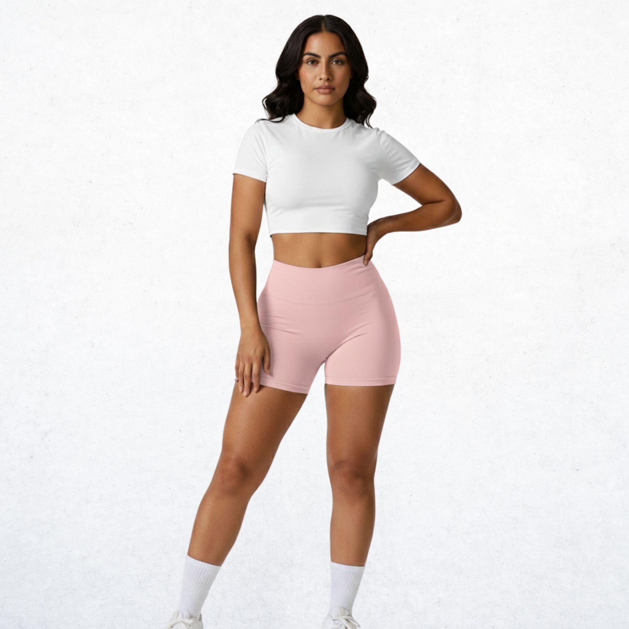 Elegante High-Waist-Shorts für Damen in Babyrosa. Vielseitige Performance-Shorts mit stilvollem Design für Workout, Yoga und Alltag. Atmungsaktiv, bequem und stylisch.